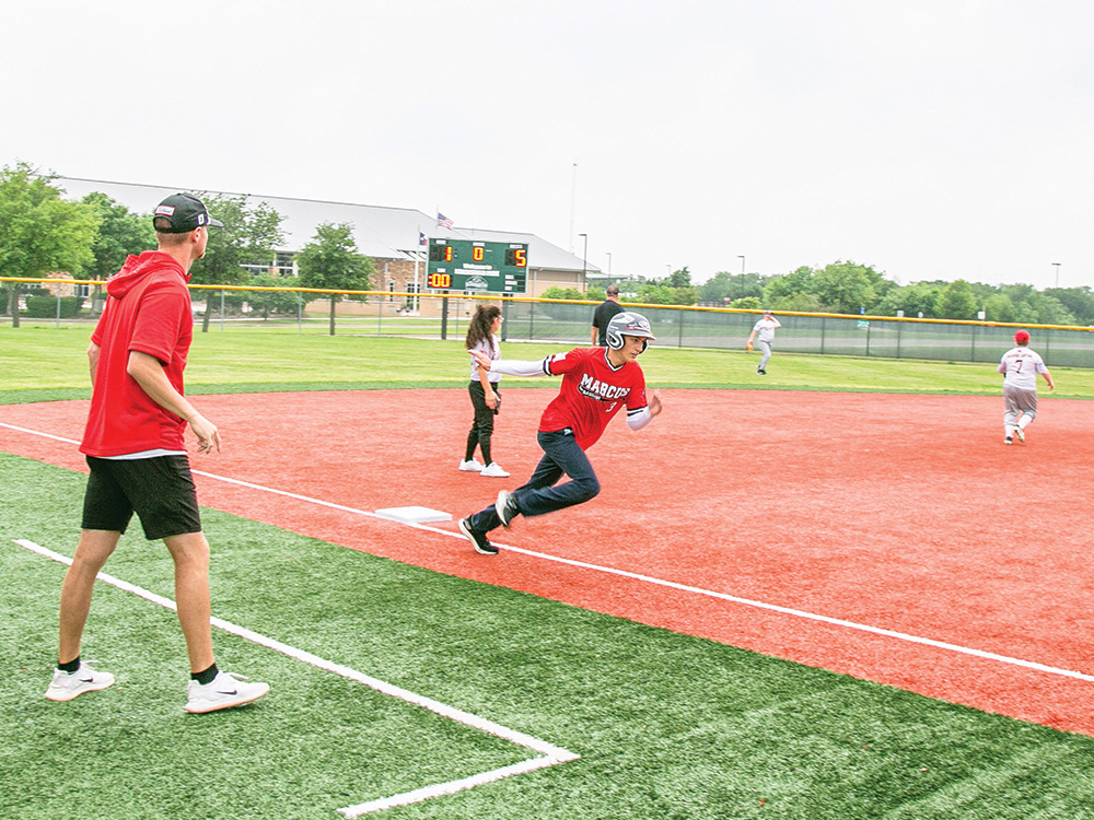 John Braugh rounds third on his inside the park homerun.