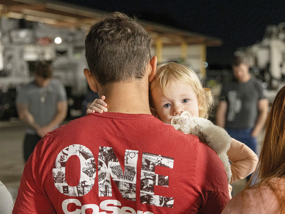 Kenny Beutter holds his daughter, Everly, before leaving. Photo by KEN OLTMANN